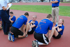 The Color Guard Team from Raleigh-Wake (MER-NC-048) participate in PT at the MER Cadet Competition.