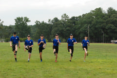 The Color Guard Team from Raleigh-Wake (MER-NC-048) stretching before PT at the MER Cadet Competition.