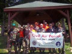 1st Lt Ron Watkins (front row/3rd from right), Squadron Commander of the OCCS