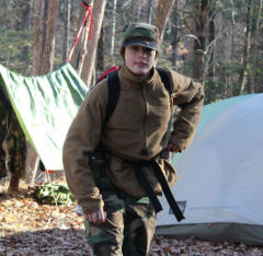 Cadets emerge from their tent on a cold, brisk morning. 