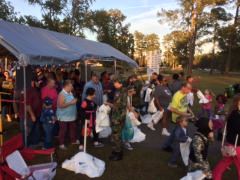 CAP members distribute bags