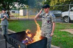 cadet burns flag