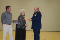 Col David Crawford presents CAP’s Congressional Gold Medal to Lt Col Jewell Bailey Brown on Jan. 7, 2015.  