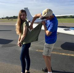 female cadet gets shirttails cut