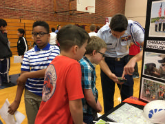cadet shows compass to kids