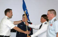 Col Orgain passes guidon