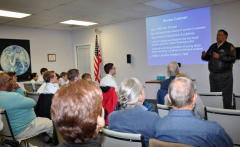 speaker in front of group