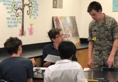 Cadet teaching students