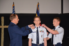 Gen Scanlan and C/Capt James Barrow pinning on the new rank for C/2nd Lt Barrow.