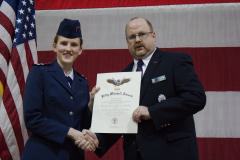 C/2nd Lt Hannah Fletcher, left, receiving her Billy Mitchell Award from North Carolina Wing Commander David Crawford.