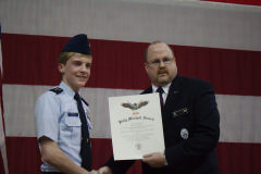 C/2nd Lt Josh Thompson, left, receiving his Billy Mitchell Award from North Carolina Wing Commander David Crawford.