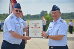 Col Crawford accepts Unit Citation Award