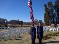 CAP C/Amn Cameron Albert and C/SrA Lindsey Brooks remember the fallen at the Wreaths Across America ceremony at the Salisbury National Cemetery on Dec. 13, 2014.