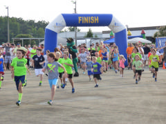  the start of the 1 mile fun run on the Rocky Mount - Wilson Regional Airport runway