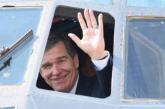 Gov Cooper waves