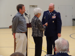 Col David Crawford presents CAP’s Congressional Gold Medal to Lt Col Jewell Bailey Brown on Jan. 7, 2015. 