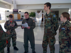 Maj Chris Bailey conducts a mission briefing prior to dispatching Ground Team 9 from the SAREX Incident Command Post on January 17, 2015.