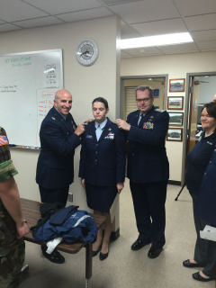 Col Moss,USAF and Capt Willis pinning C/Capt Willis